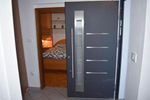 Ένα ή περισσότερα κρεβάτια σε δωμάτιο στο Lampino apartment