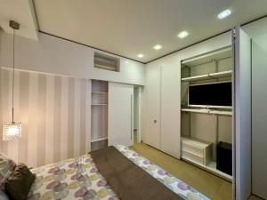 Televízia a/alebo spoločenská miestnosť v ubytovaní Interno 5 B&B