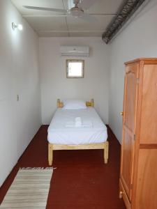 Una cama o camas en una habitación de Casa mosaico