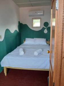 Una cama o camas en una habitación de Casa mosaico