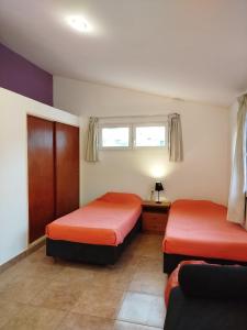 Ένα ή περισσότερα κρεβάτια σε δωμάτιο στο LA CASA Nostra