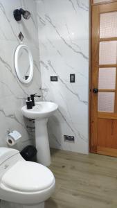 Koupelna v ubytování Cabaña Monte Santo + 9 fotografií