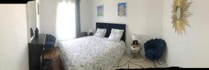 Ένα ή περισσότερα κρεβάτια σε δωμάτιο στο Bel appartement cosy et baroque