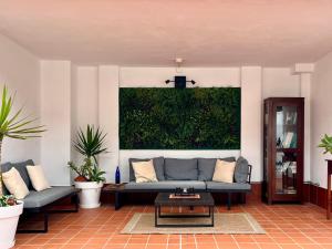 TV a/nebo společenská místnost v ubytování Apartamentos Los Verodes