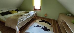 Postel nebo postele na pokoji v ubytování Hiška Tilia
