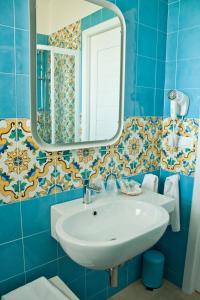 Koupelna v ubytování B&B Alalama