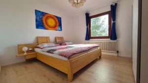 Posteľ alebo postele v izbe v ubytovaní Cottage Alpenblick