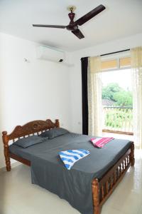 Katil atau katil-katil dalam bilik di Zalor Residency 2 +65 gambar