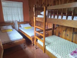 Postel nebo postele na pokoji v ubytování Rowena's Maligcong Homestay