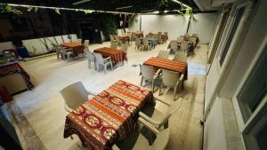 an overhead view of a restaurant with tables and chairs at Akapella in Pamukkale