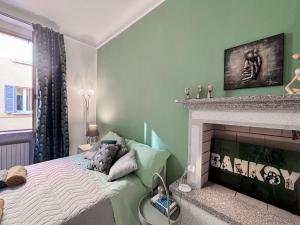 Ένα ή περισσότερα κρεβάτια σε δωμάτιο στο Elegant three-room apartment in Porta Romana Milano Cortina 2026 Winter Olympics