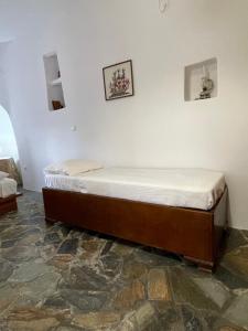 Posteľ alebo postele v izbe v ubytovaní Aegean Cottage