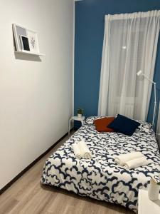 Katil atau katil-katil dalam bilik di Chiara Guest House 18 - M4 Metro blu