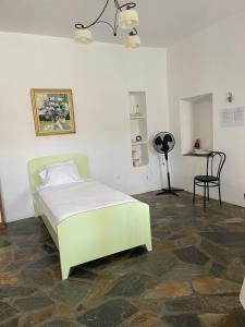 Posteľ alebo postele v izbe v ubytovaní Aegean Cottage