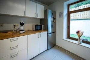 Kuchyň nebo kuchyňský kout v ubytování Maison de caractère à deux pas du Luxembourg + 13 fotografií