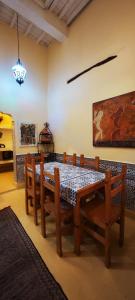 a dining room with a table and chairs at Moroccan Riad With Panoramic Sea View in Essaouira