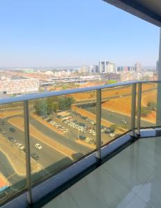 a view of a street from a balcony at MANHATTAN - JK APART Hotel in Brasilia