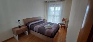 Postel nebo postele na pokoji v ubytování La Torre