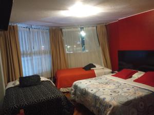 Letto o letti in una camera di Hostal Capri