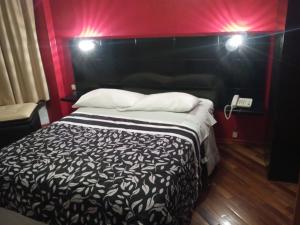 Letto o letti in una camera di Hostal Capri