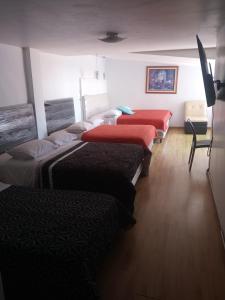 Letto o letti in una camera di Hostal Capri