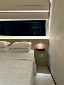 Postel nebo postele na pokoji v ubytování Loft 2 Edf celita Franca Business e flat