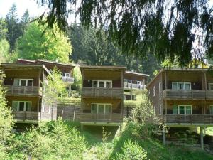 a building with balconies on the side of it at holiday village Bad Hundertpfund in Großbreitenbach