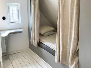 Postel nebo postele na pokoji v ubytování Holiday home SIMRISHAMN