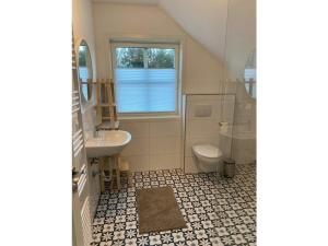 Ένα μπάνιο στο am Schilfweg Comfortable holiday residence +24 φωτογραφίες