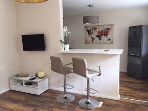 Televisyen dan/atau pusat hiburan di SchlafGut Comfortable holiday residence