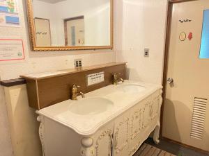 Bilik mandi di White Hill Lodge Hakuba