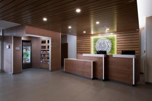 a lobby with a reception desk and a refrigerator at Fairfield Inn & Suites by Marriott Oklahoma City El Reno in El Reno +18 photos