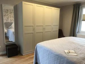 Ένα ή περισσότερα κρεβάτια σε δωμάτιο στο sea view for 2 people 41m²