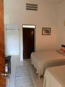 Postel nebo postele na pokoji v ubytování Hotel Quiloma Ranch