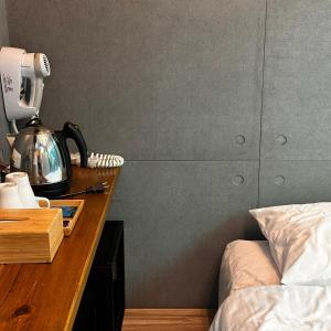 Voodi või voodid majutusasutuse 森旅行 toas