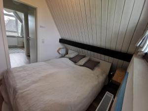Postel nebo postele na pokoji v ubytování Beach Pearl Comfortable holiday residence + 15 fotografií
