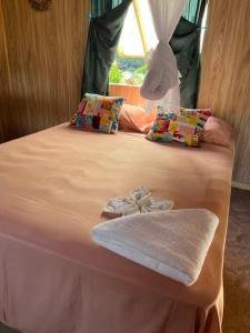 Letto o letti in una camera di Hei Maurua
