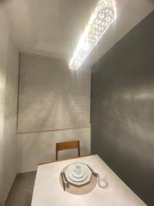 Ένα ή περισσότερα κρεβάτια σε δωμάτιο στο Copacabana JJ