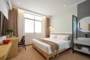 Voodi või voodid majutusasutuse 婺源县那湾那月民宿婺女洲店 toas
