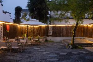 Aed väljaspool majutusasutust 婺源县那湾那月民宿婺女洲店