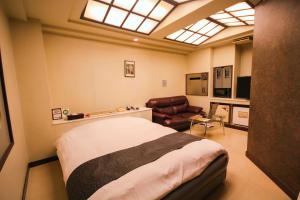 Kuchyň nebo kuchyňský kout v ubytování HOTEL Iz bayside 大人専用