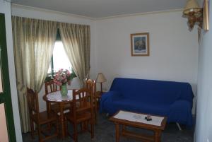 Posedenie v ubytovaní Apartamentos La Dorada + 8 fotografií