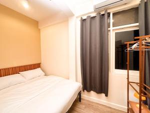 Bangkok Neighborhood Hostel客房内的一张或多张床位