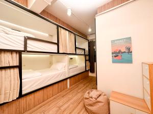 Bangkok Neighborhood Hostel客房内的一张或多张床位