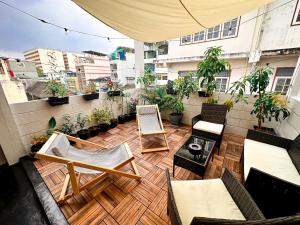 Posezení v ubytování Bangkok Neighborhood Hostel