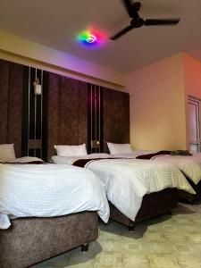 Hotel Hot Pot, Dhangadhi客房内的一张或多张床位