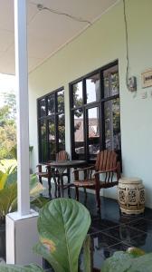 Χώρος καθιστικού στο Homestay Rejeki