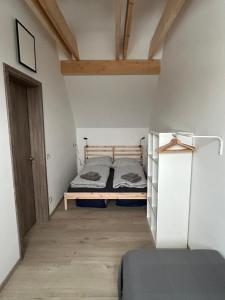 Postel nebo postele na pokoji v ubytování Horský dům Vojta