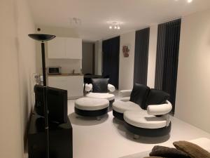 Posezení v ubytování Prachtige gastsuite in Ranst "Studio 34"