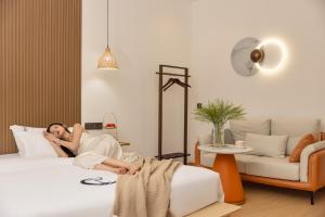 Voodi või voodid majutusasutuse 婺源县那湾那月民宿婺女洲店 toas
